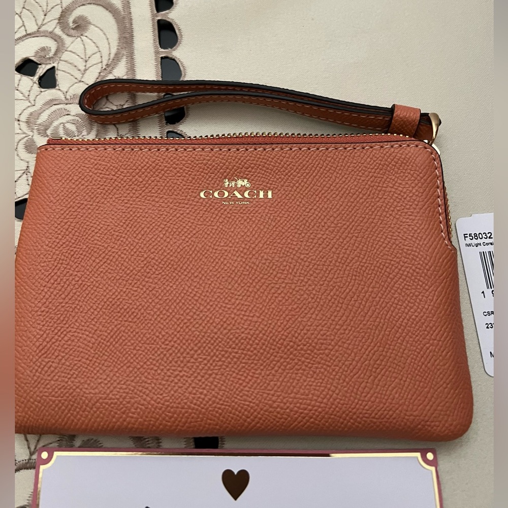 COACH Light Coral Brass Small Leather Wristle MSRP $75.00 NWT